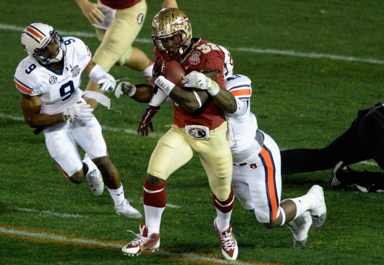 Running back James Wilder Jr. of the Florida State Seminoles runs with the ball against the Auburn Tigers during the 2014 BCS National Championship Game at the Rose Bowl on Jan. 6. (Kevork Djansezian/Getty Images)