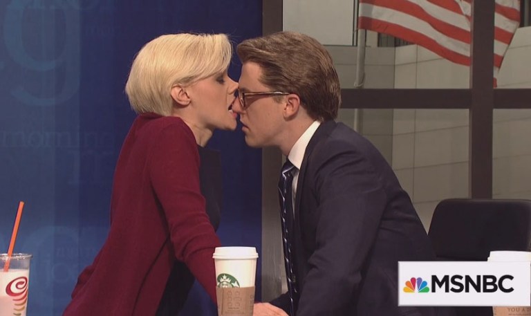 The cold opening featured sexual tension between hosts Joe Scarborough and Mika Brzezinski, portrayed by SNL's Alex Moffat and Kate McKinnon. (Screen shot)