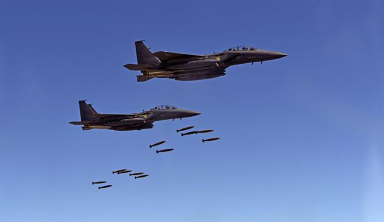 A dozen U.S., South Korean and Japanese military aircraft flew over Japan and South Korea on Wednesday and conducted live-fire bombing runs in a show of force to North Korea.