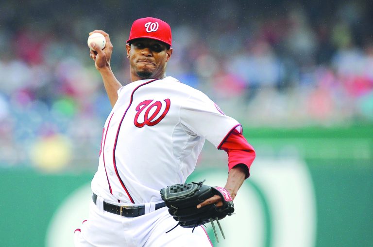 Patrick McDermott/Getty Images
Edwin Jackson allowed one run on five hits and struck out nine in seven innings but took the loss in the first game Saturday.