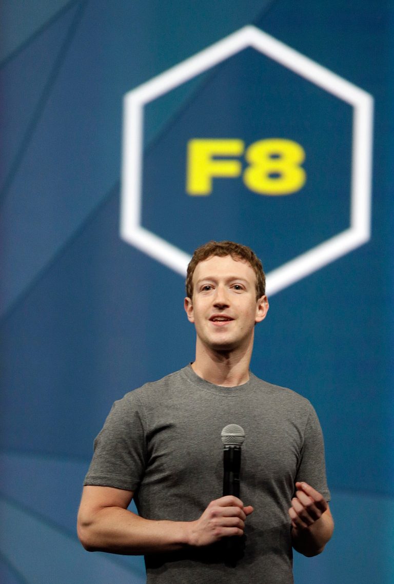 Facebook CEO Mark Zuckerberg gestures while delivering the keynote address at the f8 Facebook Developer Conference Wednesday, April 30, 2014, in San Francisco. (AP Photo/Ben Margot)