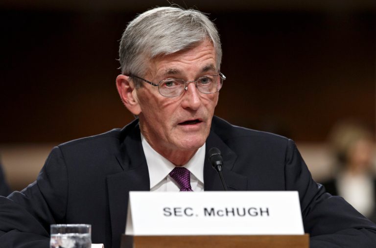 Army Secretary John M. McHugh updates members of the Senate Armed Services Committee on April 3, 2014, on Capitol Hill in Washington. (AP Photo/J. Scott Applewhite)