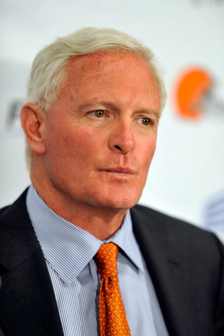 File- This May 29, 2013, file photo shows Cleveland Browns owner Jimmy Haslam during a news conference in Cleveland. Authorities say the truck-stop company owned by Jimmy Haslam and Tennessee Gov. Bill Haslam has agreed to pay $92 million in fines for cheating customers out of promised rebates and discounts. The agreement was signed by attorneys for the nation's largest diesel retailer Friday. The agreement does not protect any individual at Pilot from prosecution and requires the company to cooperate with an ongoing investigation of current and former employees. Haslam has said he was unaware of the scheme. Tenn. Gov. Bill Haslam is not involved in Pilot's day-to-day operations. (AP Photo/David Richard, File)