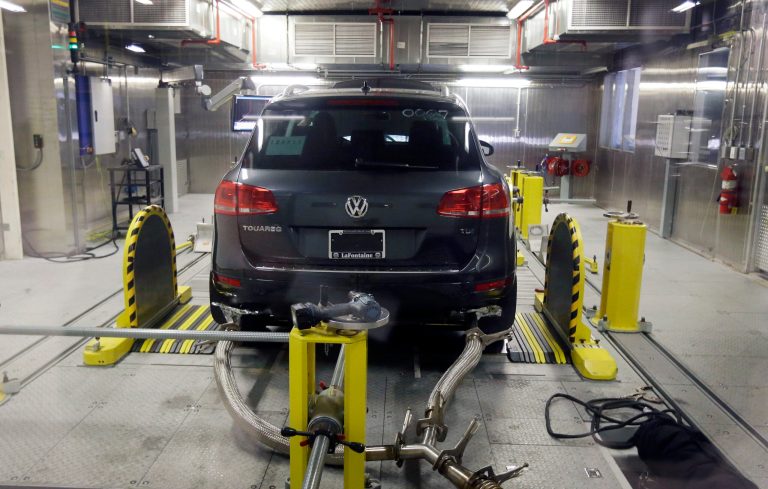 In this Oct. 13, 2015 file photo, a Volkswagen Touareg diesel is tested in the Environmental Protection Agency's cold temperature test facility in Ann Arbor, Mich. The U.S. government says Volkswagen cheated a second time on emissions tests, programming about 10,000 cars with larger diesel engines. (AP Photo/Carlos Osorio, File)