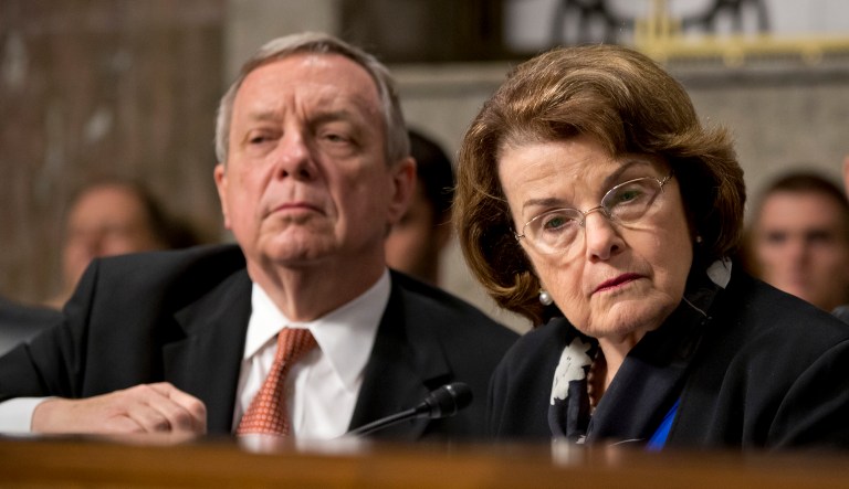 The 10-day ad campaign takes aim at Democratic Sens. Dianne Feinstein and Dick Durbin for their questioning of Notre Dame law professor Amy Coney Barrett. (AP Photo/J. Scott Applewhite)