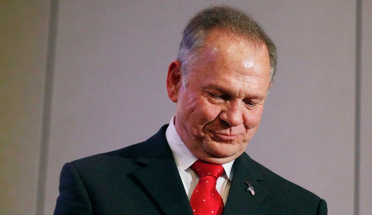 One day earlier, the steering committee of the state Republican Party affirmed its support for Moore. (AP Photo/Brynn Anderson)