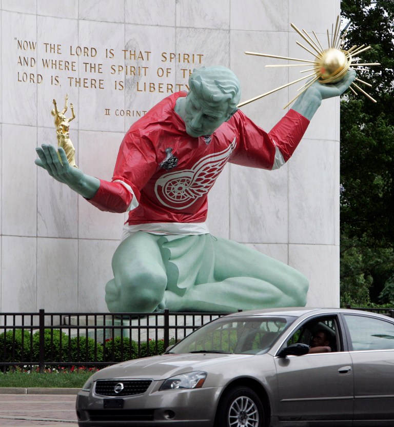 The Spirit of Detroit statue wears a Detroit Red Wings jersey in downtown Detroit. (AP/Carlos Osorio)