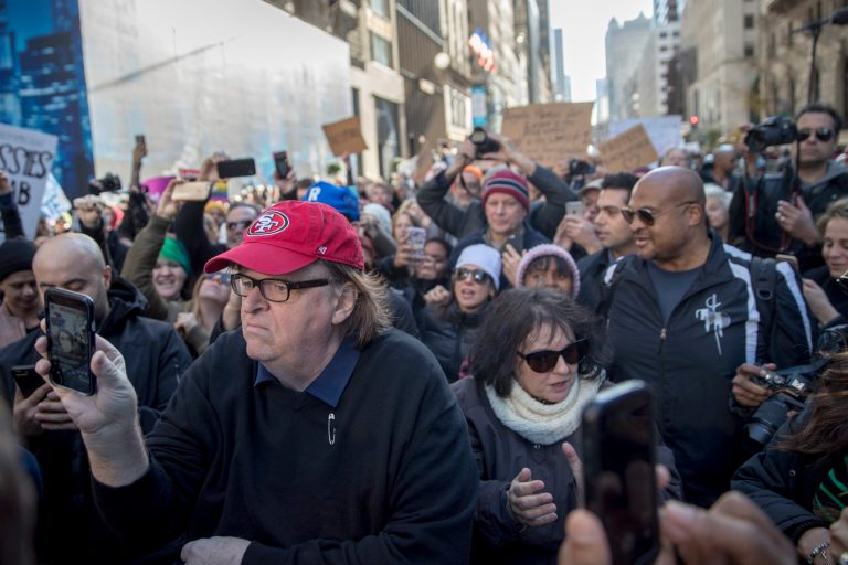 Progressive filmmaker Michael Moore posted a list of five actions his supporters should do to disrupt Trump's presidency. (AP Photo/Mary Altaffer)