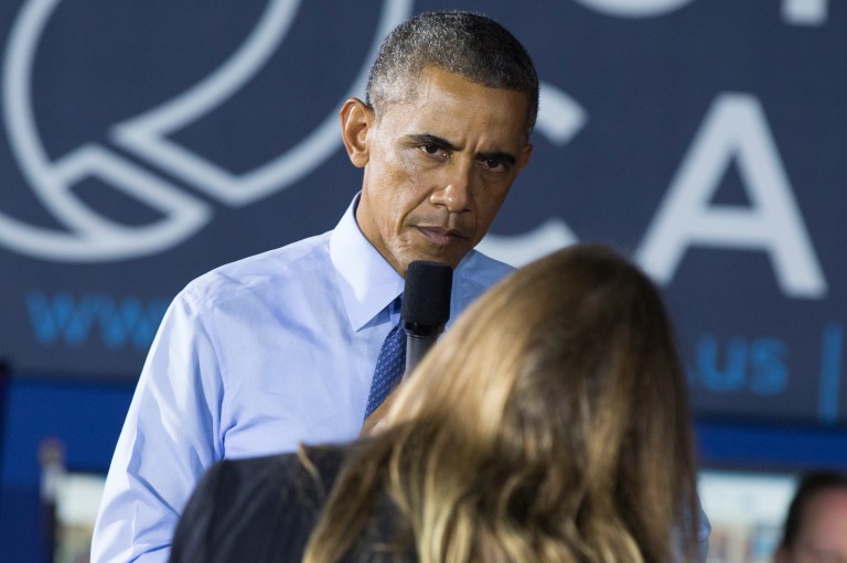 President Barack Obama listens to a question during a town hall event at Cross Campus, a collaborative space that brings together freelancers, creative professionals, entrepreneurs and startup teams, on Thursday, Oct. 9, 2014, in Santa Monica, Calif. Obama is traveling in Los Angeles for an overnight trip during which he will discuss the nation's economy and designate a swath of Southern California mountains as a national monument. (AP Photo/Evan Vucci)