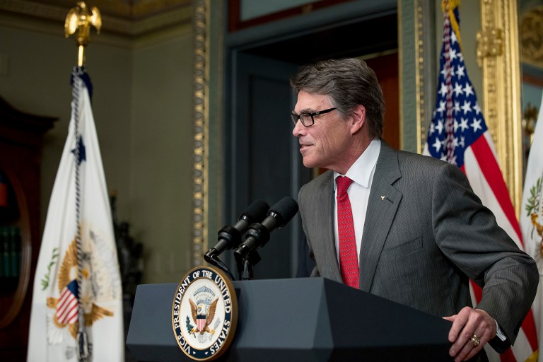 In fact, Jeff Miller reportedly put the hipster glasses on the governor's nose himself. (AP Photo/Andrew Harnik)