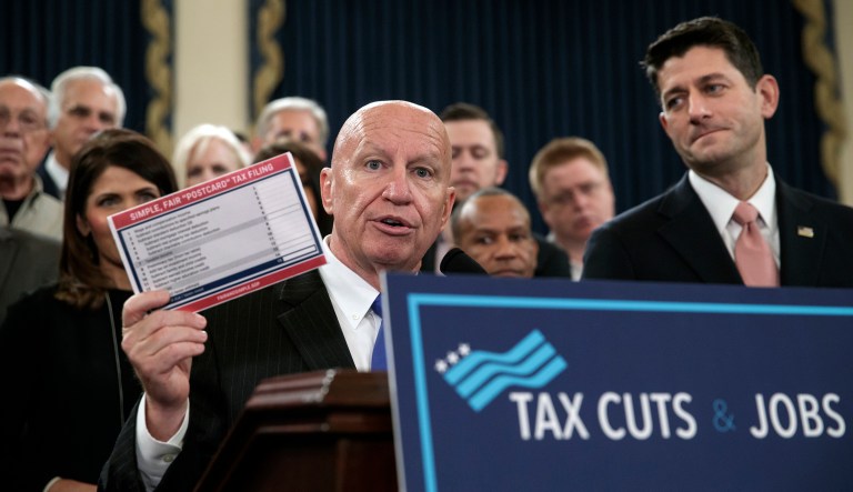 House Ways and Means Committee Chairman Kevin Brady, R-Texas, joined by Speaker of the House Paul Ryan, R-Wis., right, holds a proposed 