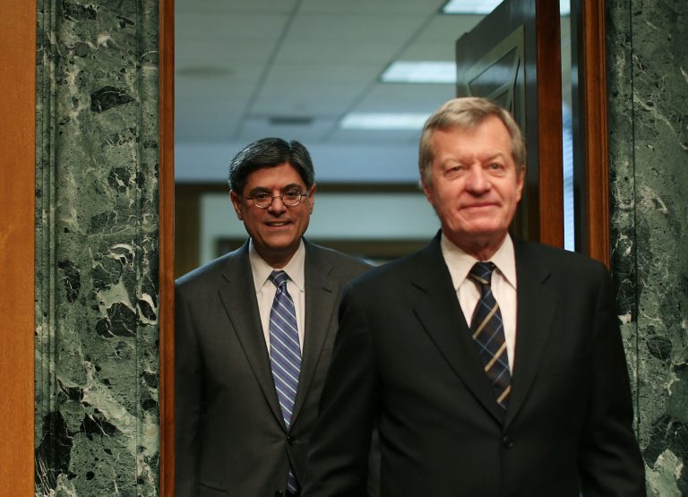 WASHINGTON, DC - FEBRUARY 13:  Treasury Secretary nominee Jack Lew (L) walks into his Senate Finance Committee confirmation hearing with Chairman Max Baucus (D-MT), February 13, 2013 in Washington, DC. If confirmed by the U.S. Senate Mr. Lew will replace Tim Geithner as Treasury Secretary.  (Photo by Mark Wilson/Getty Images)