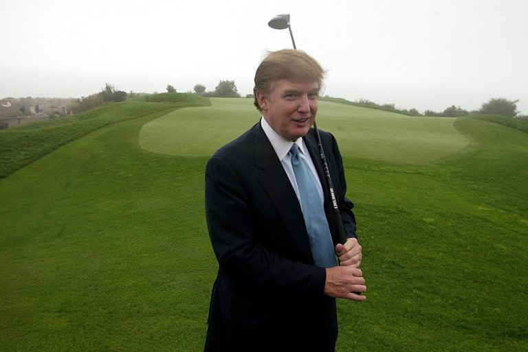 Critics have panned him because he was a vocal critic of his predecessor, Barack Obama, and his penchant for playing golf while in office. (AP Photo/Damian Dovarganes)