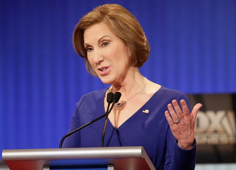 From her opening shot at Hillary Clinton to her spirited responses and digs at Donald Trump, Fiorina shined. (AP Photo/Chuck Burton)