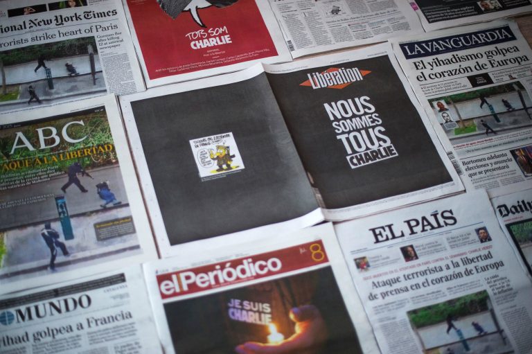 The front covers of newspapers, 'International New York Times,' 'ABC,' 'Liberation,' 'La Vanguardia,' 'El Mundo,' 'El Periodico' and 'El Pais' are display headlining the terrorist attacks yesterday in Paris on January 8, 2015 in Barcelona, Spain. France is on maximum security threat level after twelve people were killed, including two police officers, at the offices of the satirical magazine Charlie Hebdo in Paris on January 7. (Photo Illustration by David Ramos/Getty images)
