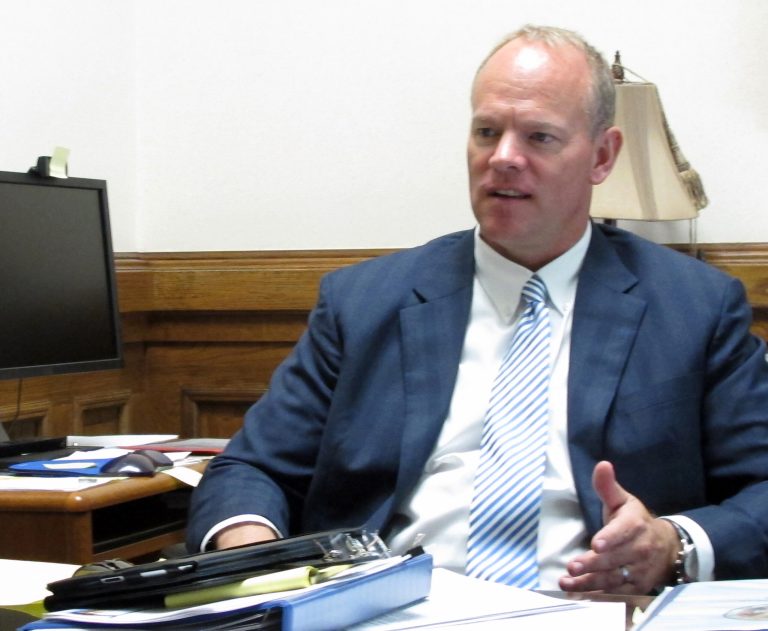   Wyoming Gov. Matt Mead sits in his office at the State Capitol in Cheyenne, Wyo. on Friday, June 15, 2012. Mead recently returned from a meeting on clean coal technology in China. (AP Photo/Ben Neary)  