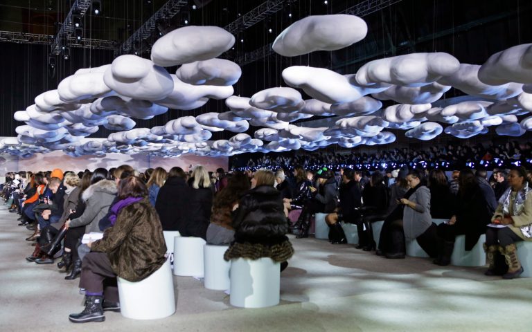 Prop clouds are suspended from above for the Marc Jacobs Fall 2014 collection at Fashion Week in New York, Thursday, Feb. 13, 2014.  (AP Photo/Kathy Willens)