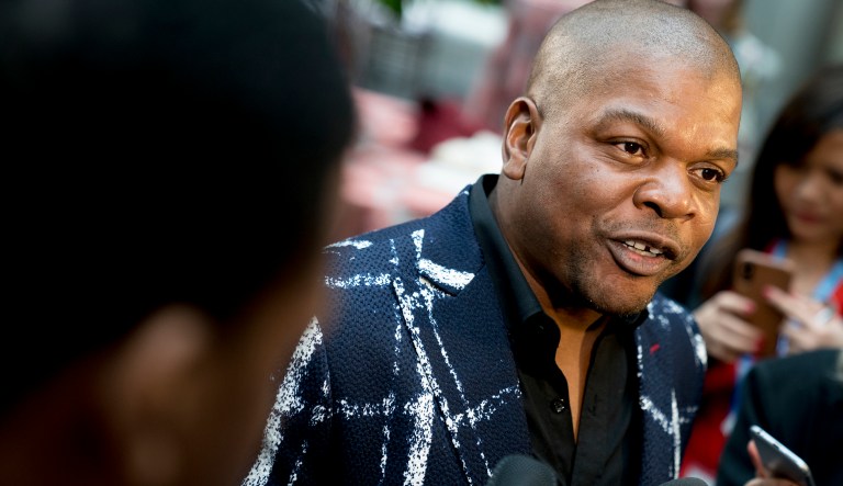 There are at least two instances where Kehinde Wiley painted portraits of black women holding a knife in one hand and the decapitated head of a white woman in the other. (AP Photo/Andrew Harnik)