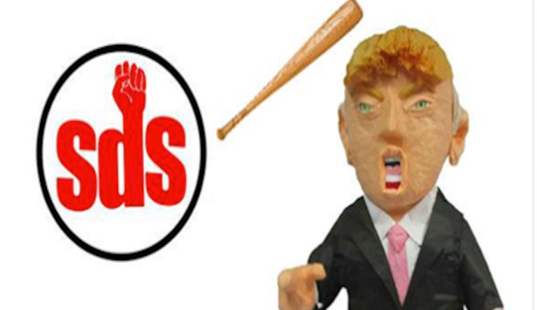 Video obtained by Red Alert Politics shows a woman hitting a small Trump piÃ±ata over and over again while students stand around and cheer. (Facebook)