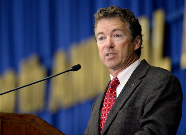 Kentucky Senator Rand Paul address the audience at the 50th annual Kentucky Country Ham Breakfast, Thursday, Aug. 22, 2013 at the Kentucky State Fairgrounds in Louisville, Ky. (AP Photo/Timothy D. Easley)