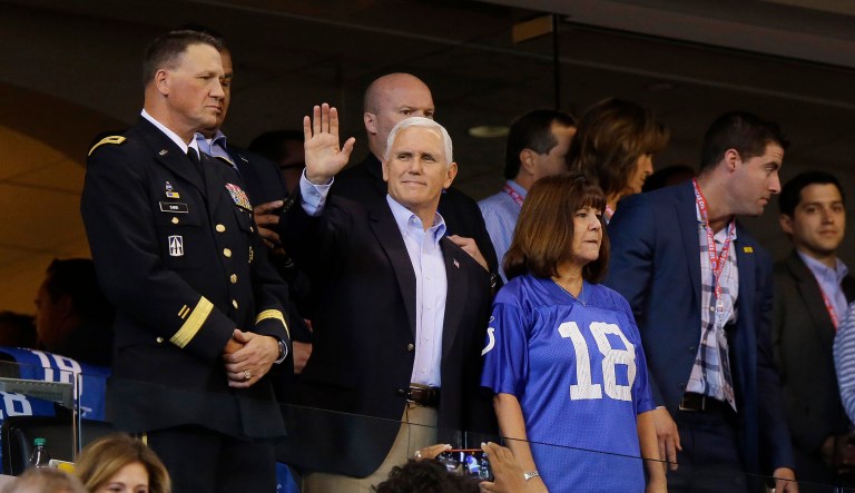 Like Kaepernick, Pence stole the spotlight to create drama to win points. (AP Photo/Michael Conroy)