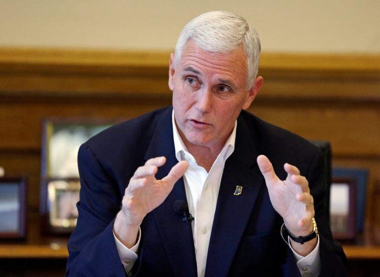 Indiana Gov. Mike Pence discusses the legislative session that ended the day before during a press conference at the Statehouse in Indianapolis, Thursday, April 30, 2015. (AP Photo/Michael Conroy)
