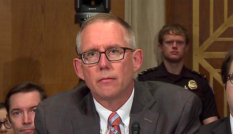 John Ring told Sen. Elizabeth Warren and other Democrats he took the issue of conflicts of interest 