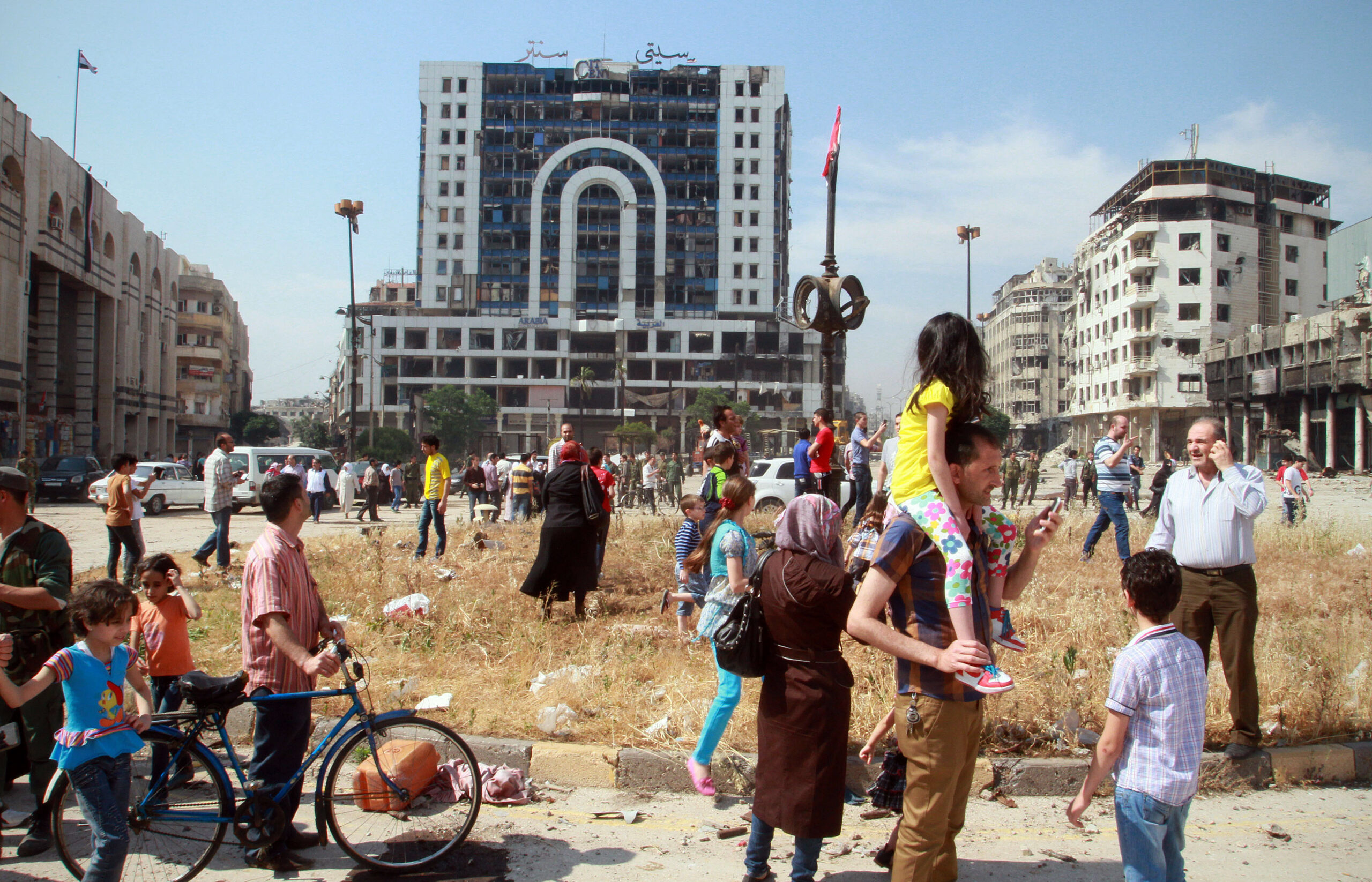 Syrians return to damaged homes after rebels leave