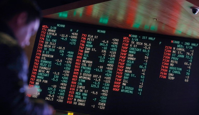 The poll found that 55 percent support legalized sports gambling, the first time that a majority of Americans have supported the idea. (AP Photo/John Locher, File)