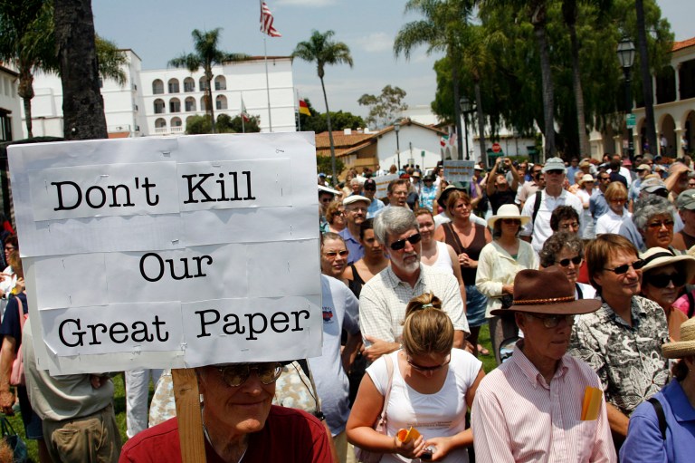 Members of the community fill De La Guerra Plaza in front of the Santa Barbara News-Press newspaper's office during a rally Tuesday, July 18, 2006, in Santa Barbara, Calif. Mass resignations, rallies and charges and countercharges of newsroom meddling and biased coverage have rocked the Santa Barbara News-Press. (AP Photo/Michael A. Mariant)