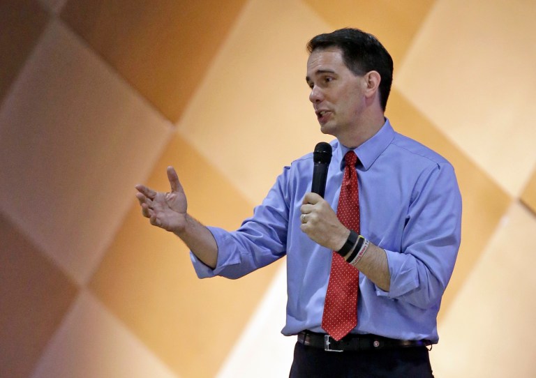 Republican presidential candidate, Wisconsin Gov. Scott Walker, speaks at the Alabama GOP summer luncheon as he tours the South, Saturday, Aug. 22, 2015, at the International Sports Hall of Fame in Talladega, Ala. (AP Photo/Butch Dill)