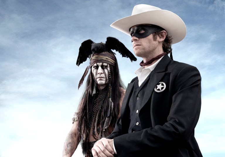 This publicity image released by Disney shows Johnny Depp as Tonto, left, and Armie Hammer as The Lone Ranger, in a scene from 