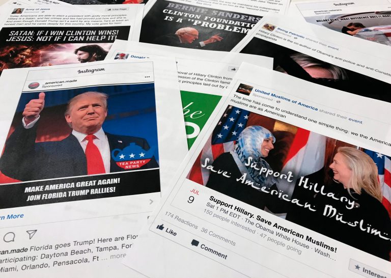 Some of the Facebook and Instagram ads linked to a Russian effort to disrupt the American political process and stir up tensions around divisive social issues, released by members of the U.S. House Intelligence committee, are photographed in Washington, on Wednesday, Nov. 1, 2017. (AP Photo/Jon Elswick)