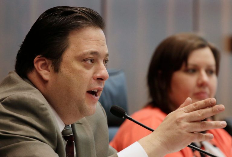 FILE - In this April 16, 2014 file photo, Illinois state Rep. Bob Rita, D-Blue Island, presides over a hearing on gaming legislation in Chicago. Plans to expand gambling in Illinois were put on hold Friday, May 30, 2014, when Rita, the backer of legislation proposing new casinos, said he wouldn't call the measure for a vote until he resolved lingering issues and had key support. (AP Photo/M. Spencer Green)