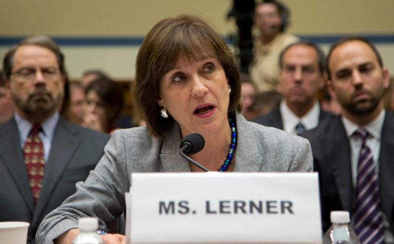 IRS official Lois Lerner speaks on Capitol Hill in Washington, Wednesday, May 22, 2013, during the House Oversight and Government Reform Committee hearing to investigate the extra scrutiny IRS gave to Tea Party and other conservative groups that applied for tax-exempt status. Lerner told the committee she did nothing wrong and then invoked her constitutional right to not answer lawmakers' questions. (AP Photo/Carolyn Kaster)