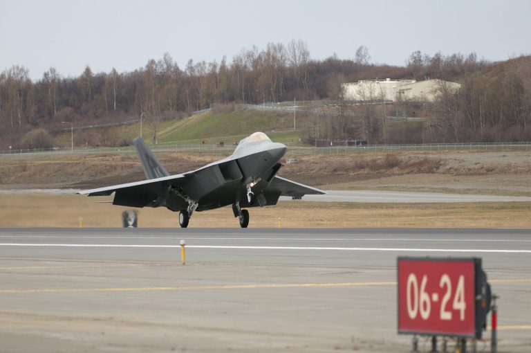 The last manufactured F-22 Raptor fighter, flown by U.S. Air Force Lt. Col. Paul Moga, 525th Fighter Squadron commander, touches down, Saturday, May 5, 2012 at the Joint Base Elmendorf-Richardson, Alaska. (AP/U.S. Air Force, David Bedard)