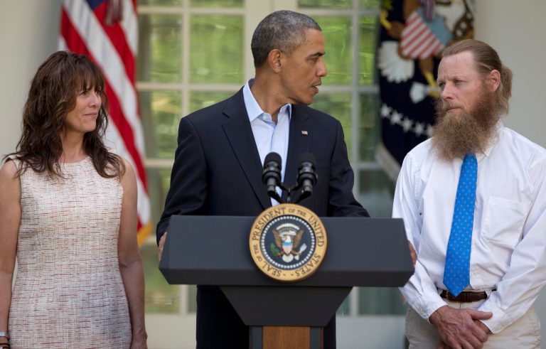President Barack Obama looks to Bob Bergdahl as Jani Bergdahl, stands at left, during a news conference in the Rose Garden of the White House in Washington on Saturday, May 31, 2014 about the release of their son, U.S. Army Sgt. Bowe Bergdahl. Bergdahl, 28, had been held prisoner by the Taliban since June 30, 2009. He was handed over to U.S. special forces by the Taliban in exchange for the release of five Afghan detainees held by the United States. (AP Photo/Carolyn Kaster)