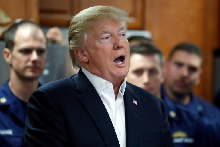 President Donald Trump speaks with members of the U.S. Coast Guard, at the Lake Worth Inlet Station, on Thanksgiving, Thursday, Nov. 23, 2017, in Riviera Beach, Fla. (AP Photo/Alex Brandon)