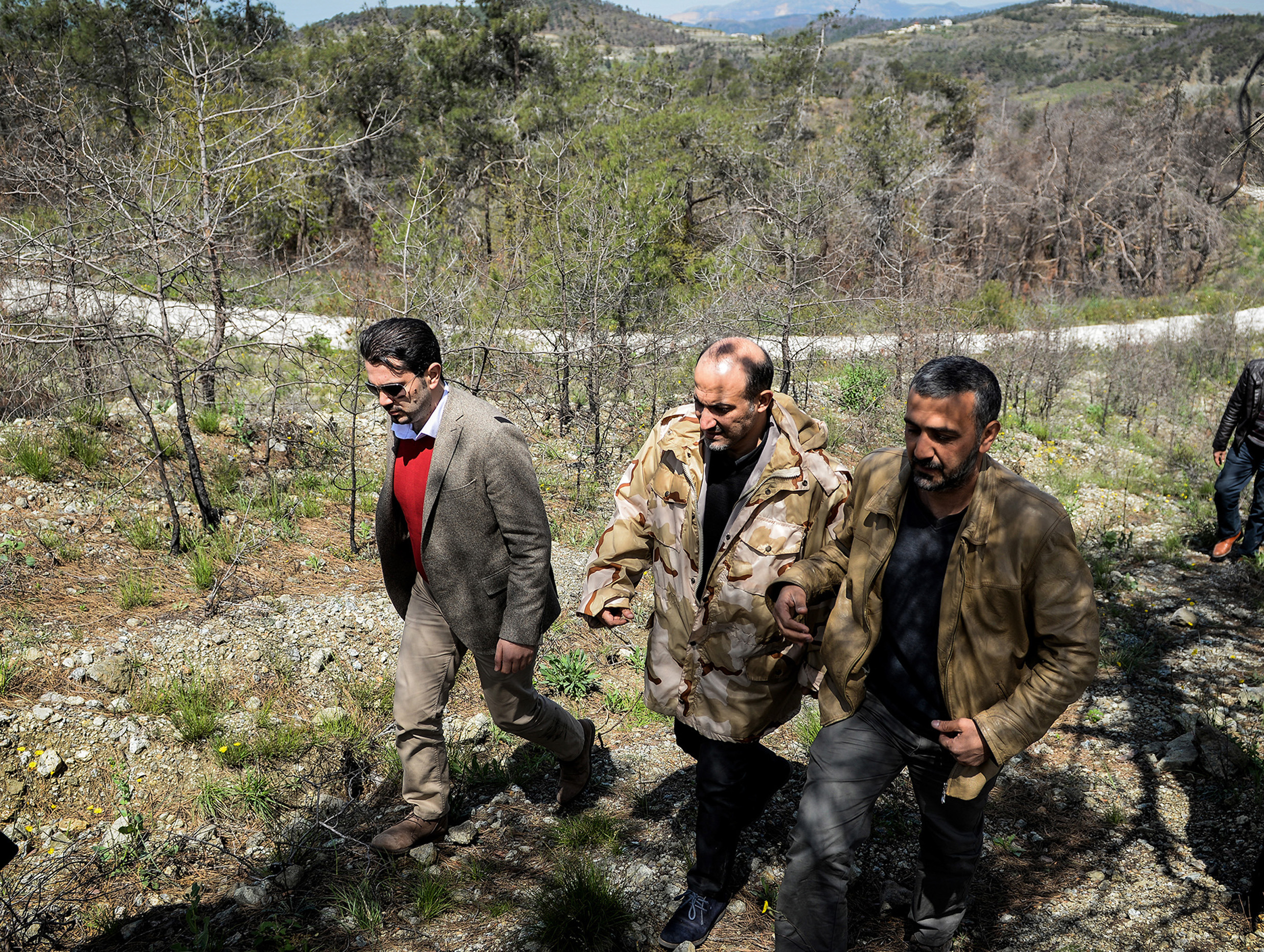 Syrian report: mortar shells kill 5 in Damascus