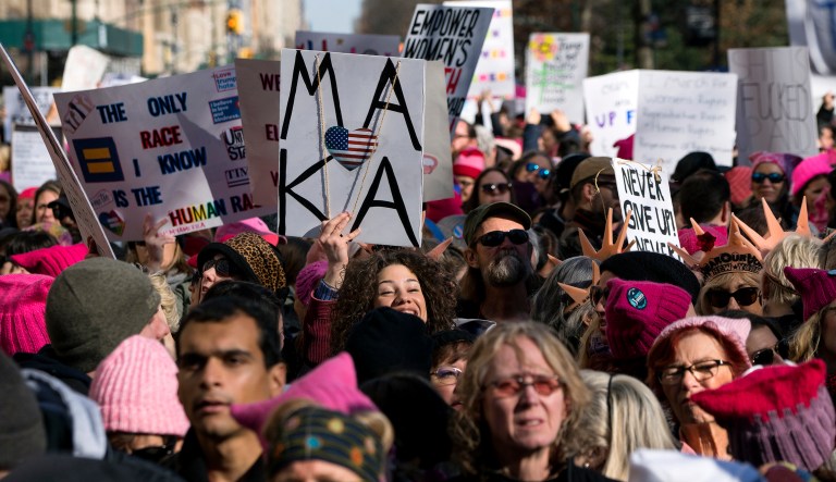 People line up on Central Park West as they wait for the start of the Women's March in New York City. The New York protest was among more than 200 such actions planned for the weekend around the world. (AP Photo/Craig Ruttle)