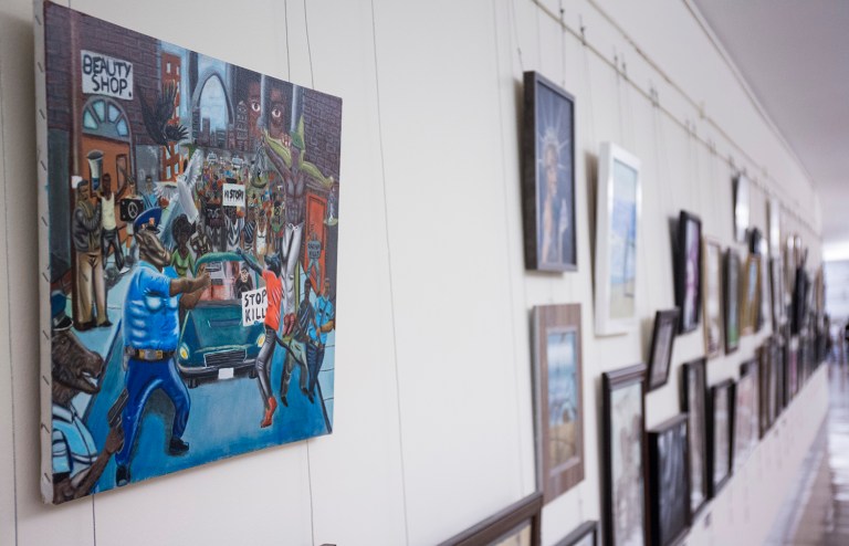 A student's painting that divided members of Congress for its depiction of Ferguson, Mo., has been removed from its Capitol Hill display, this time more permanently. (AP Photo/Zach Gibson, File)