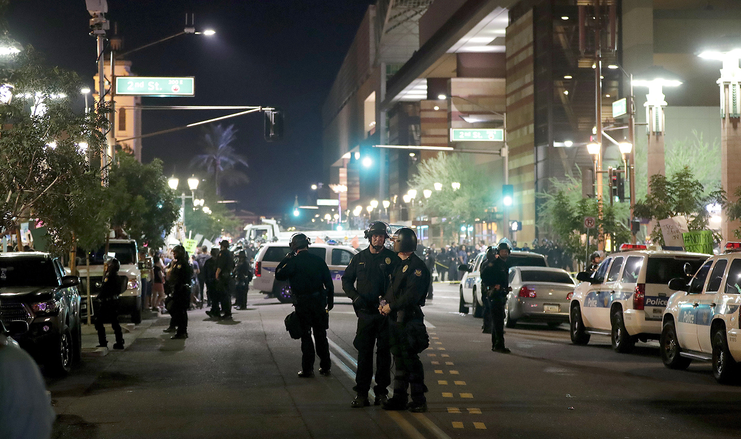 Chaos breaks out as protesters clash with police outside of Trump rally in Phoenix