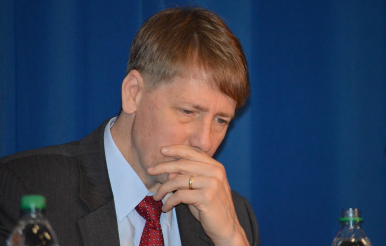 Sam Batkins, director of regulatory policy for American Action Forum, estimated that the Bureau has imposed $2.8 billion in regulatory costs since coming into existence altogether, and that $2.6 billion of that happened after its current director, Richard Cordray (above), was confirmed by the Senate in 2013. (AP Photos/Russell Contreras)