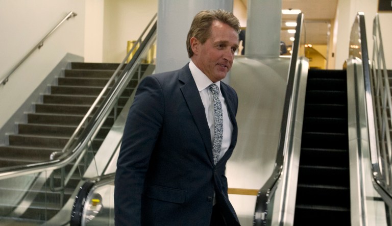 Sen. Jeff Flake, R-Ariz., (pictured above) tweeted Wednesday that he is working with Sen. Dianne Feinstein, D-Calif., to raise the minimum age of purchasing assault rifles (like the AR-15) to 21 years old. (AP Photo/Jose Luis Magana)