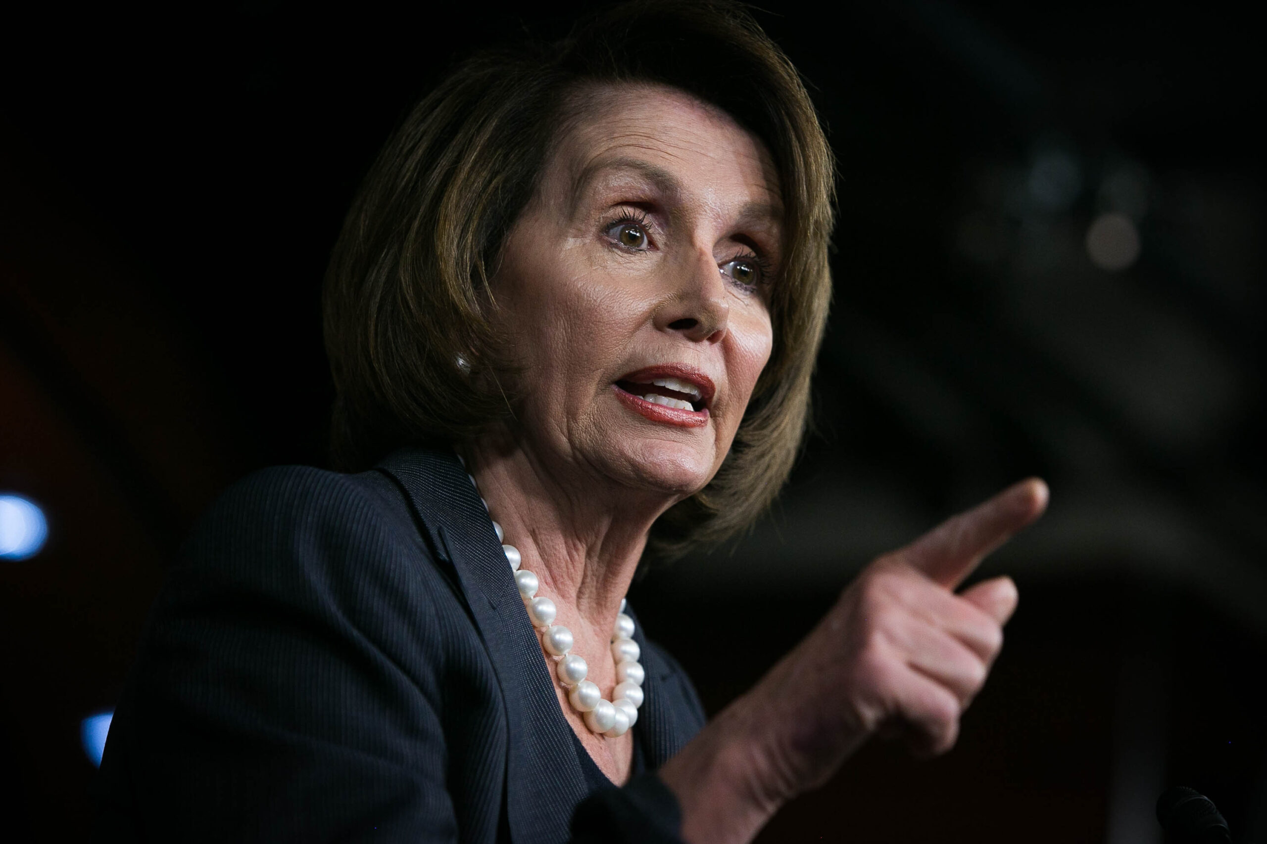 Pelosi sides with Apple CEO over locked iPhone