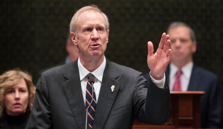 Republican Gov. Bruce Rauner's veto of the fiscal 2018 budget came just hours after the Democrat-controlled state Senate hastily passed the $36 billion legislation and $5 billion income tax hike. (Ted Schurter/The State Journal-Register via AP, File)
