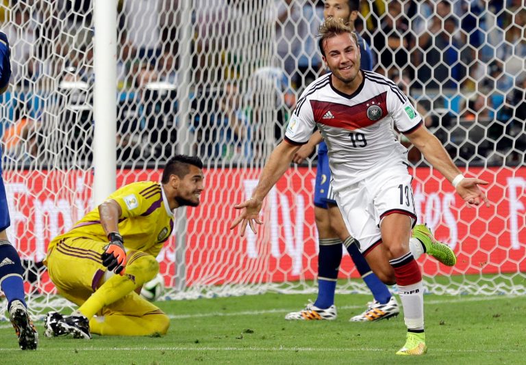 Germany's Mario Goetze celebrates after scoring the opening goal during the World Cup final soccer match between Germany and Argentina at the Maracana Stadium in Rio de Janeiro, Brazil, Sunday, July 13, 2014. Germany won 1-0 to win the World Cup. (AP Photo/Victor R. Caivano)