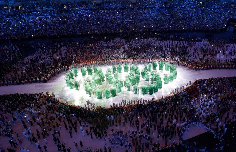The 2016 Summer Olympics in Rio de Janeiro commenced Friday night with an opening ceremony that made a global plea to reverse climate change and conserve the Earth's resources. (AP Photo/Tim Donnelly)
