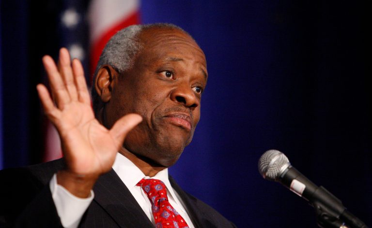 Supreme Court Justice Clarence Thomas addresses the Federalist Society in Washington, Thursday, Nov. 15, 2007, where he spoke about his new book and took questions from the audience. (AP Photo/Charles Dharapak)