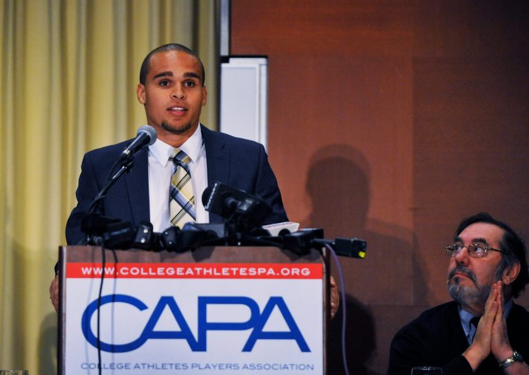 Northwestern quarterback Kain Colter speaks at a press conference on Jan. 28, 2014, at the Hyatt Regency Hotel in Chicago. (Photo by David Banks/Getty Images)